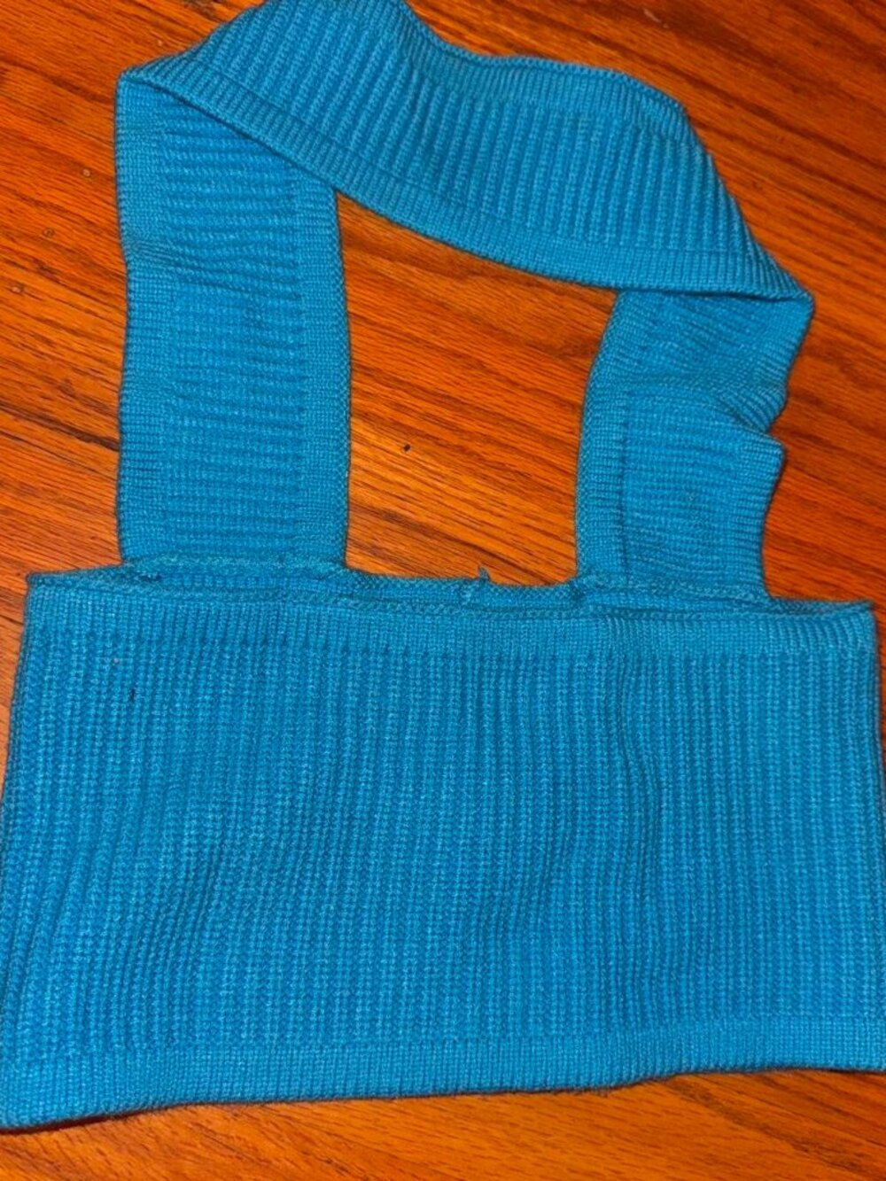 Blue crop top with open back can be worn different ways